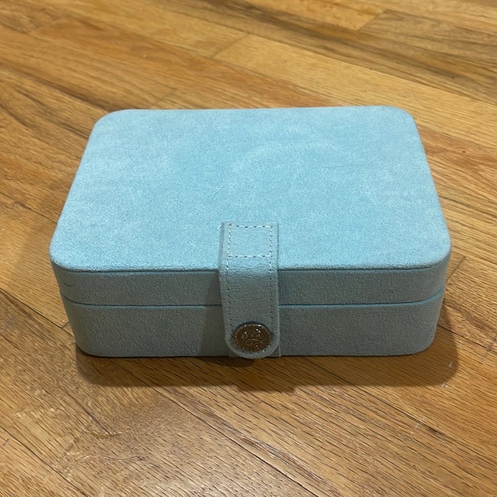 Jewelry box  light blue with a snap closure
